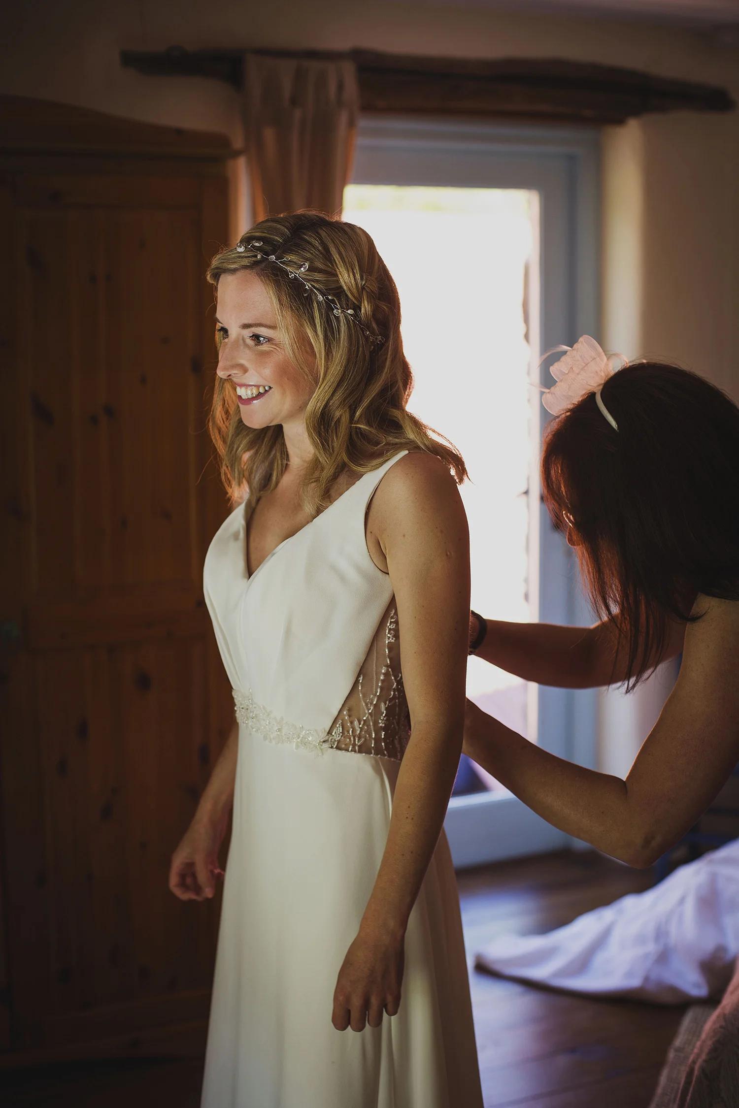 bride getting into dress nantwen