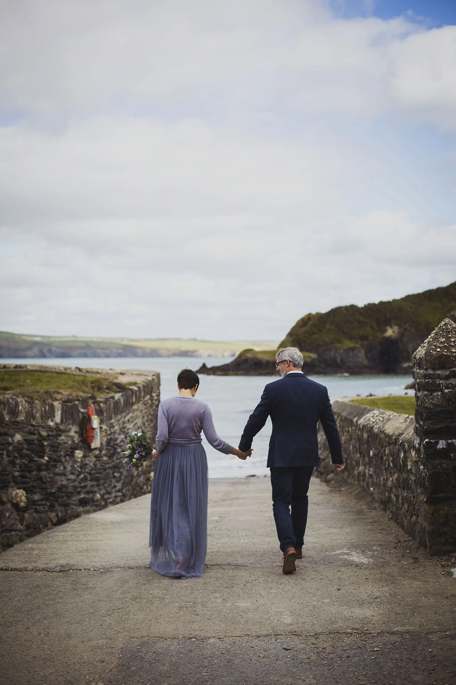 bride and groom at beach nantwen wedding photographer pembrokeshire wedding photography