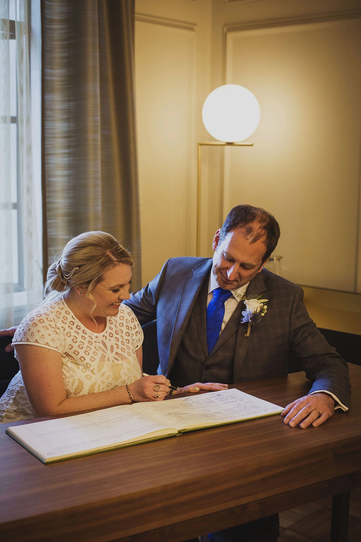 signing register wedding ceremony pimlico room the old marylebone town hall wedding photographer