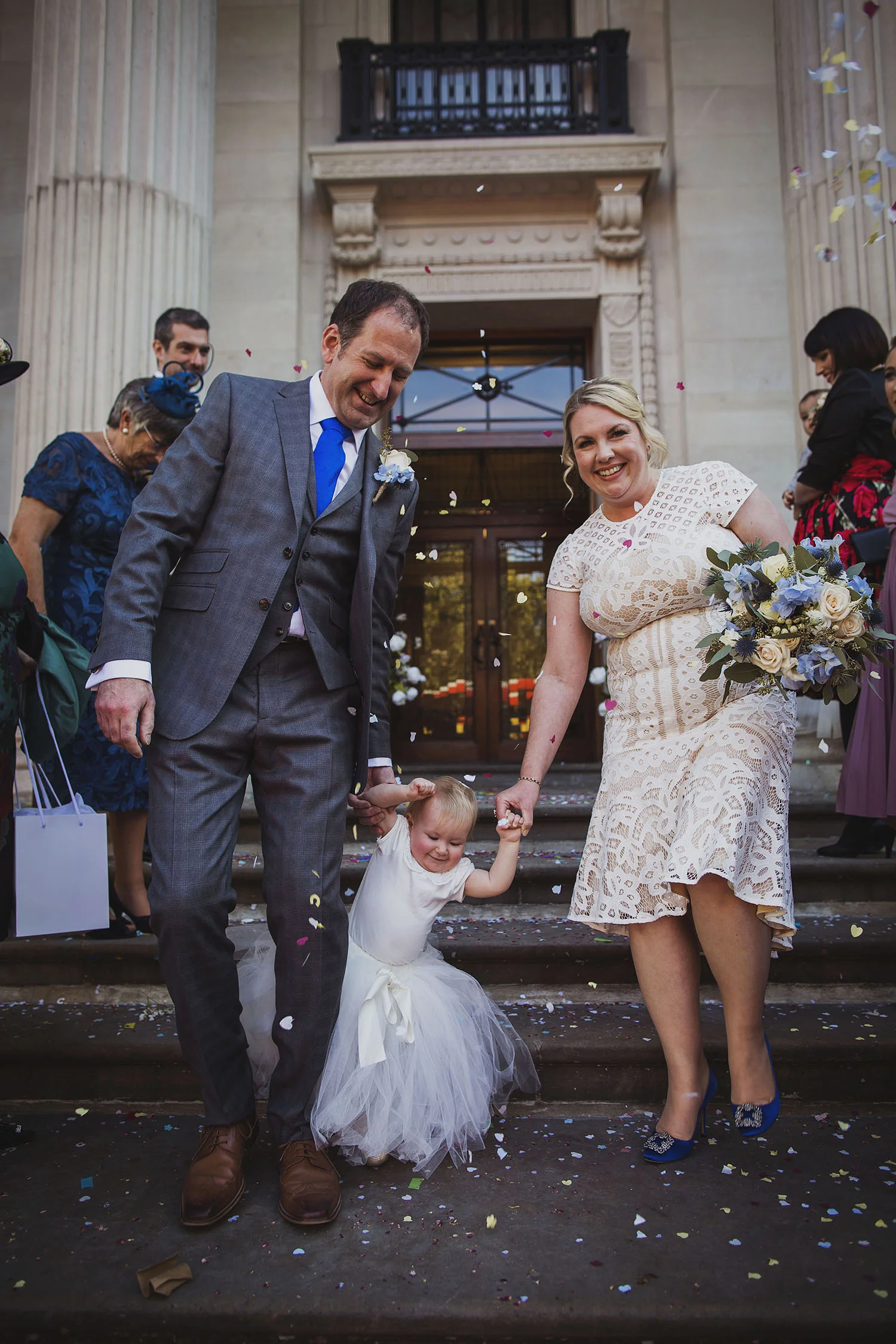 confetti on steps of the old marylebone town hall wedding photographer