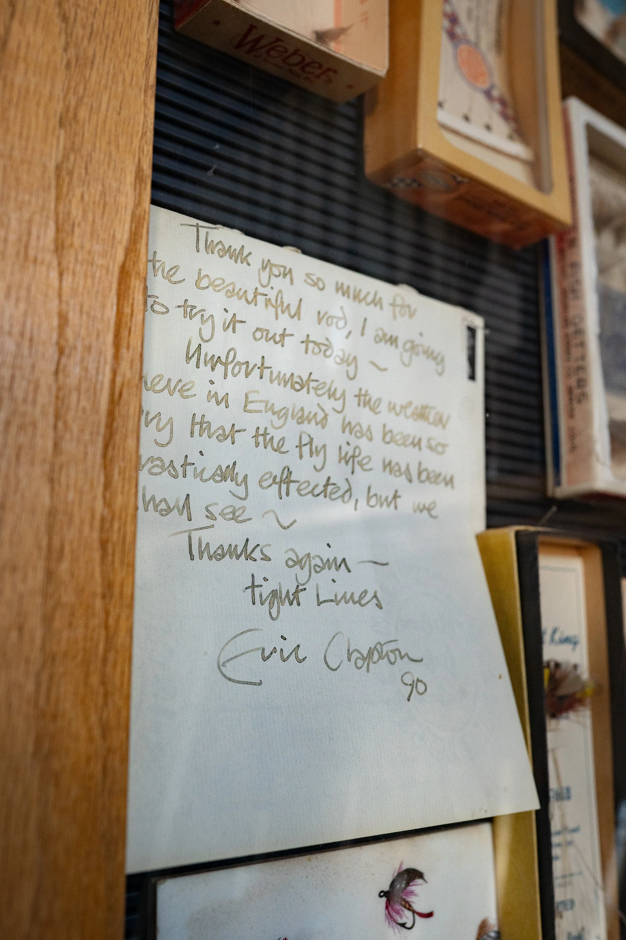 Handwritten note from fly fishing writer John Gierach displayed inside South Creek Ltd.