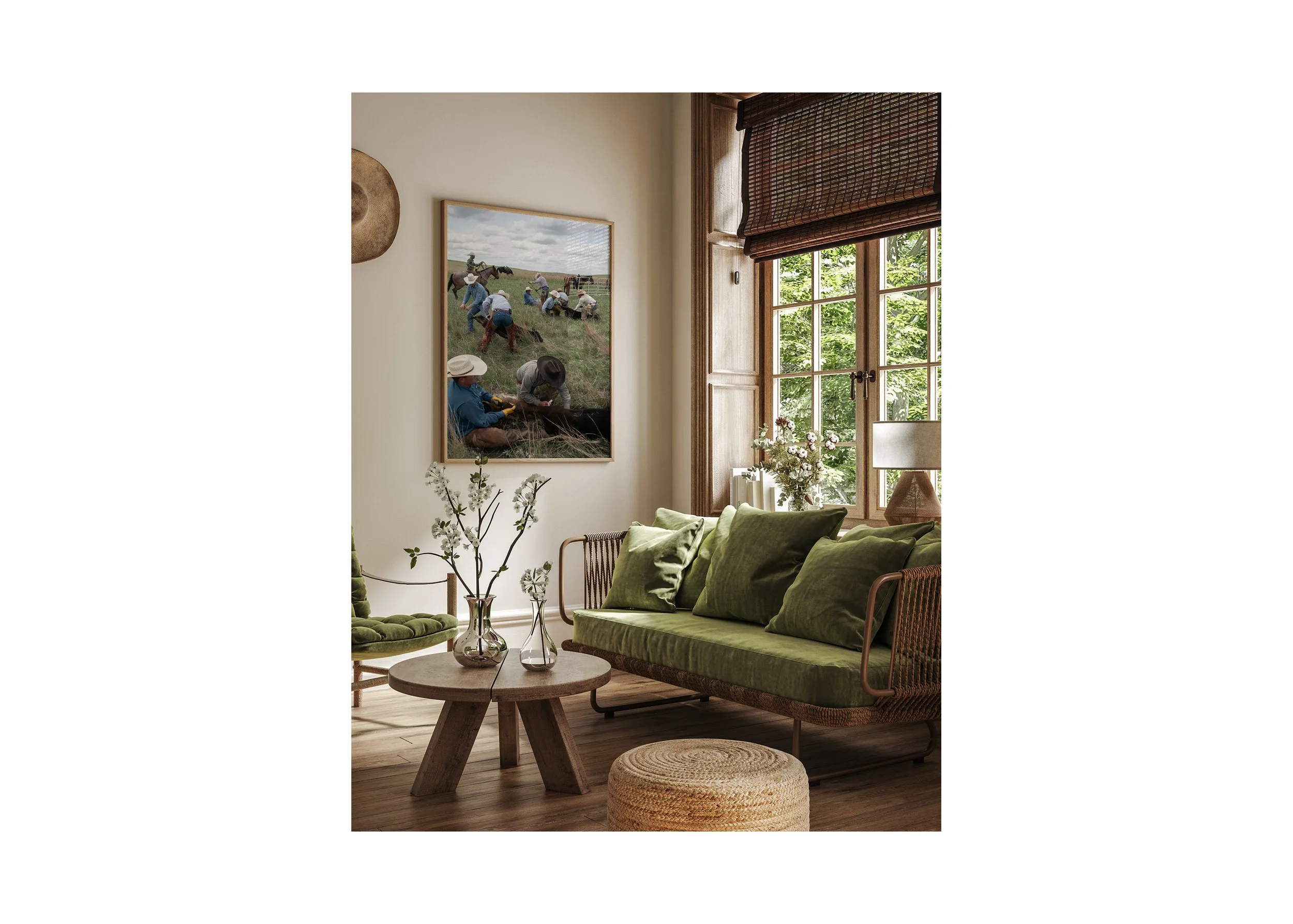 Framed cowboy branding photograph hanging on a wall in a modern rustic interior, showing working cowboys during a spring branding on open prairie land.