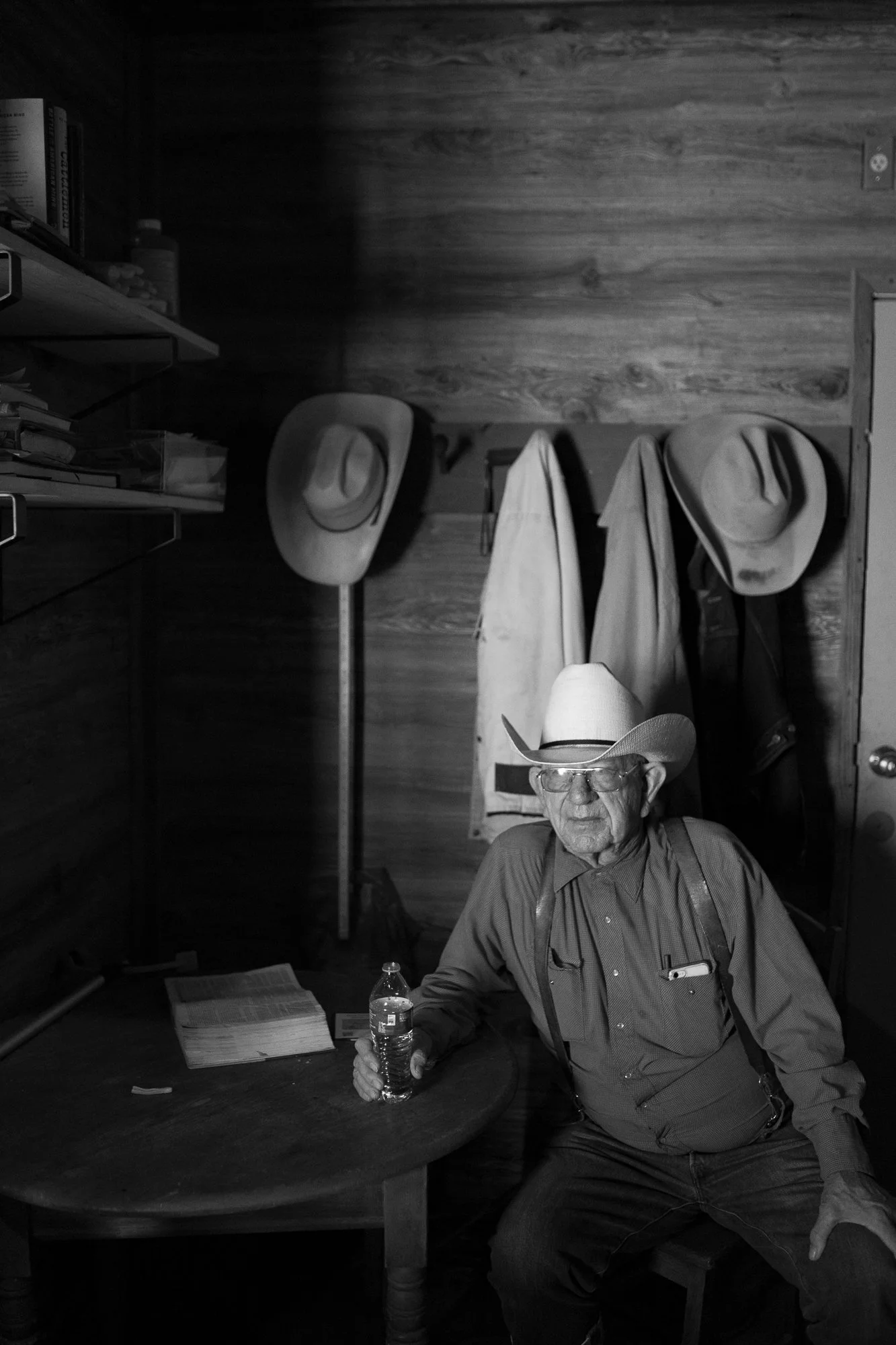 Black and white portrait of cowboy Tom Moorhouse on his ranch in Texas