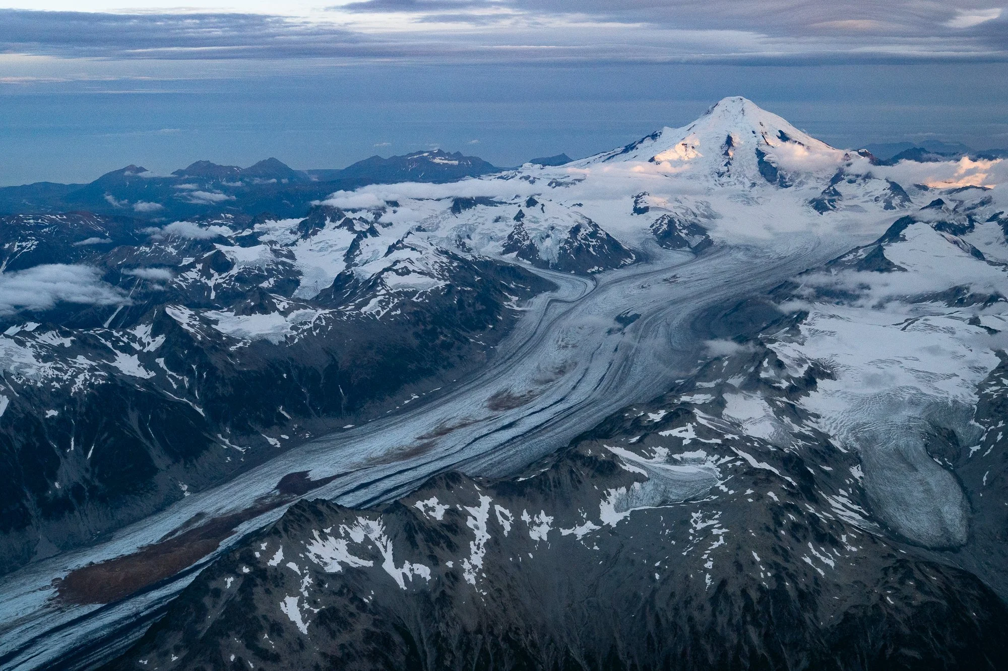 Snow covered Alaskan mountains and landscape viewed from the air