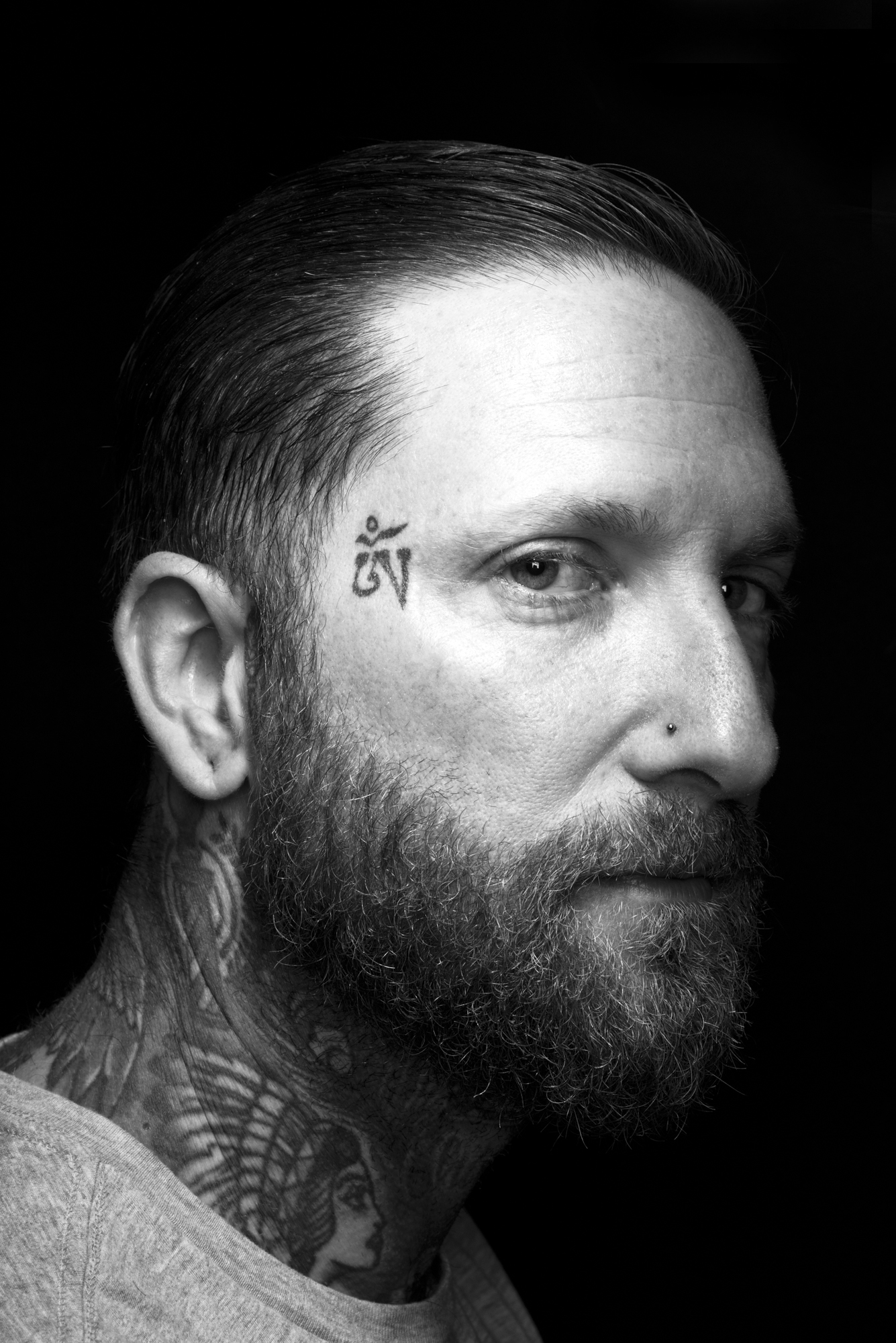  Portrait of a tattooed barber in Portland, Oregon 