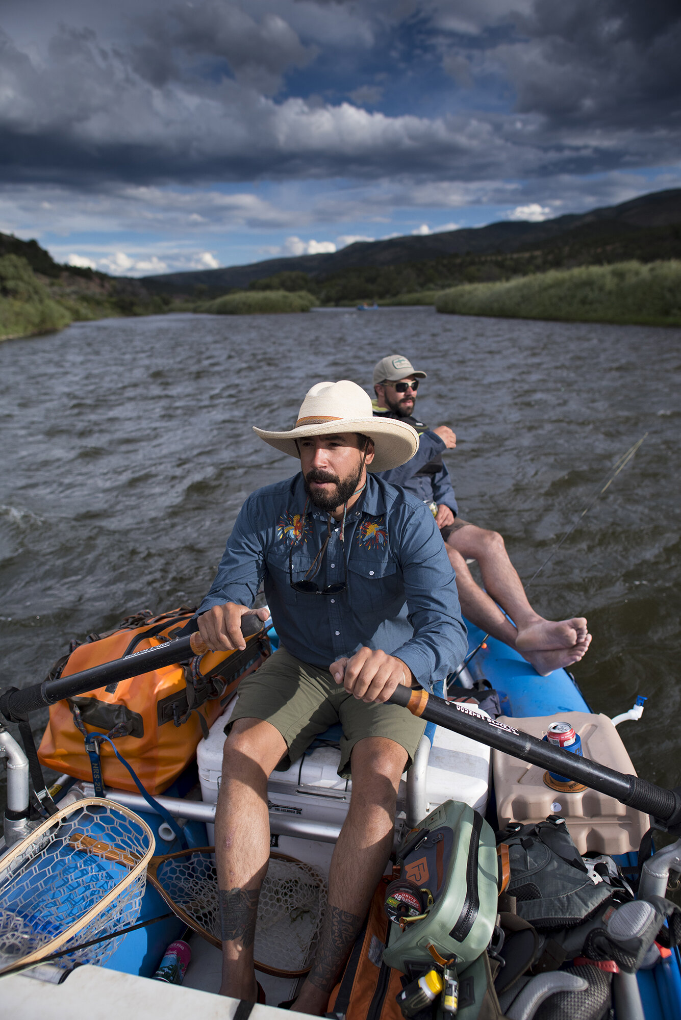  Paddling a float raft down the Colorado River.  