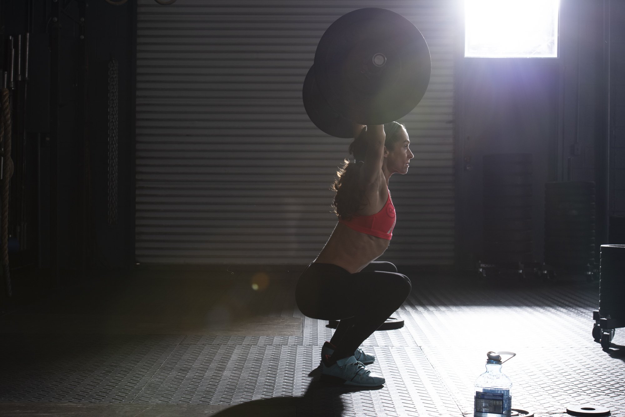  A female athlete working out at a CrossFit gym - Fitness Photography 