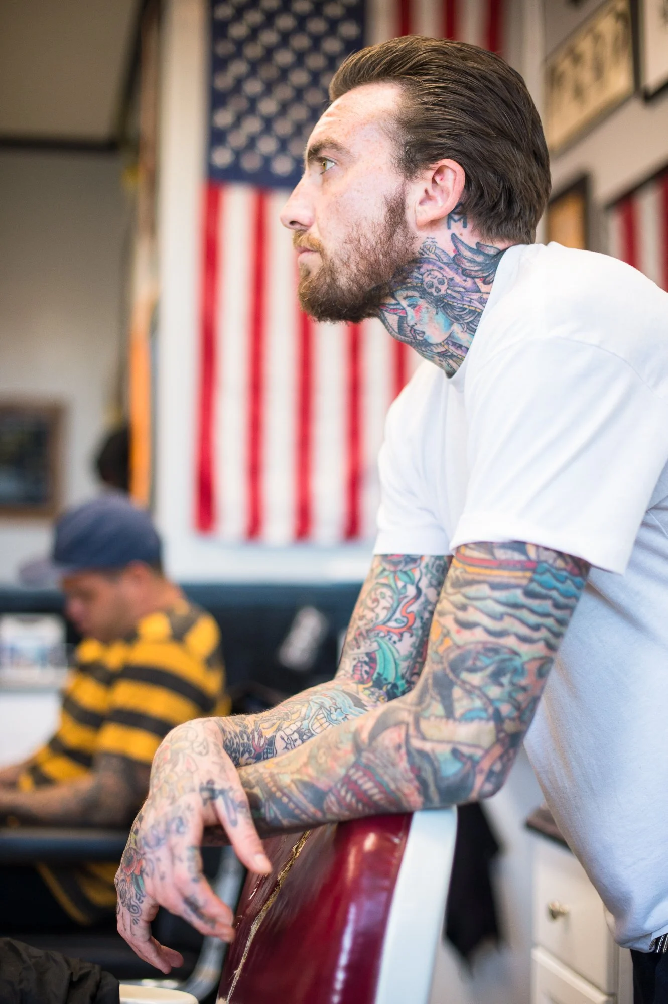  Photograph of a tattooed barber in Southern California  
