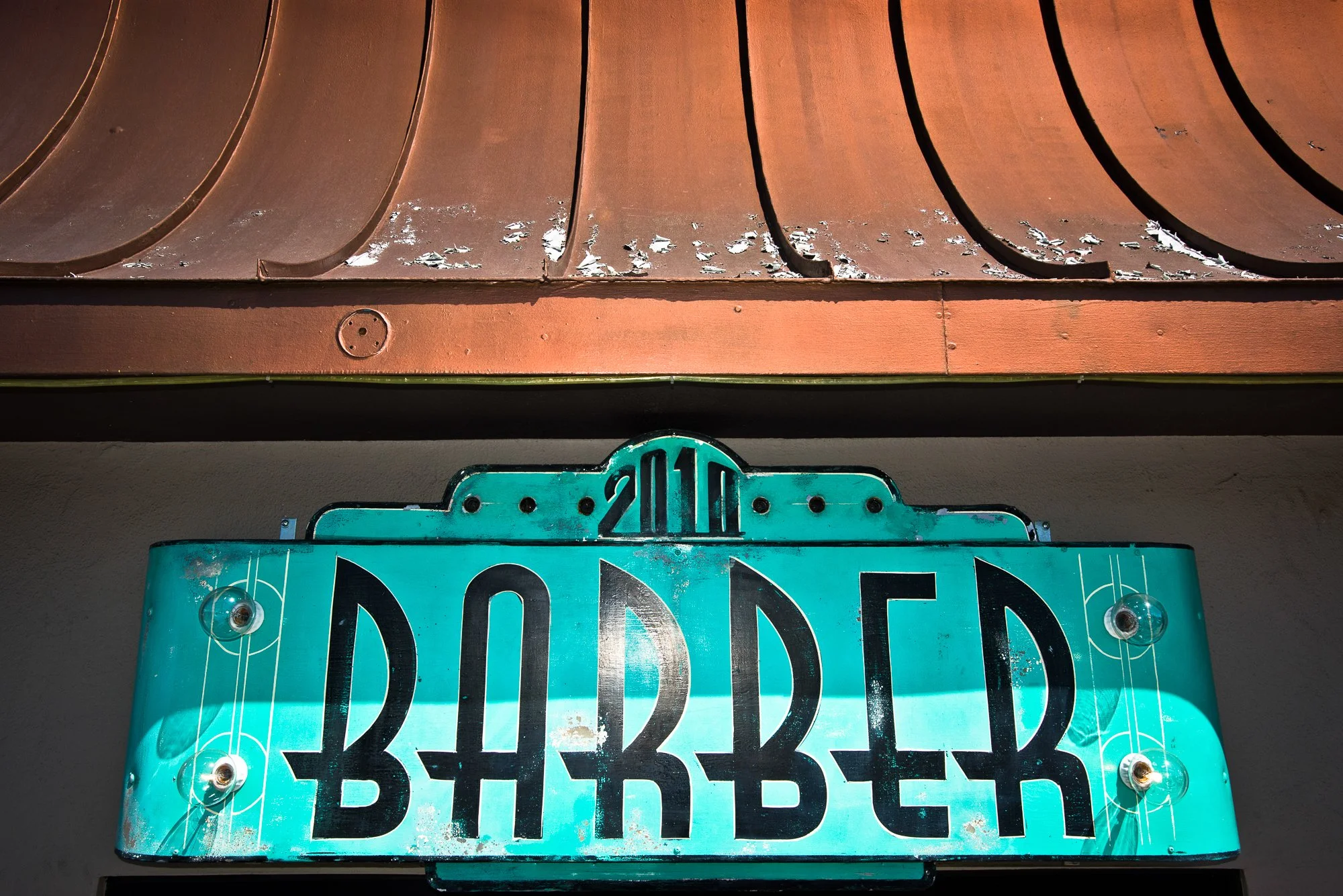  Photograph of a custom barbershop sign for Pappy’s Barbershop in San Diego, CA 