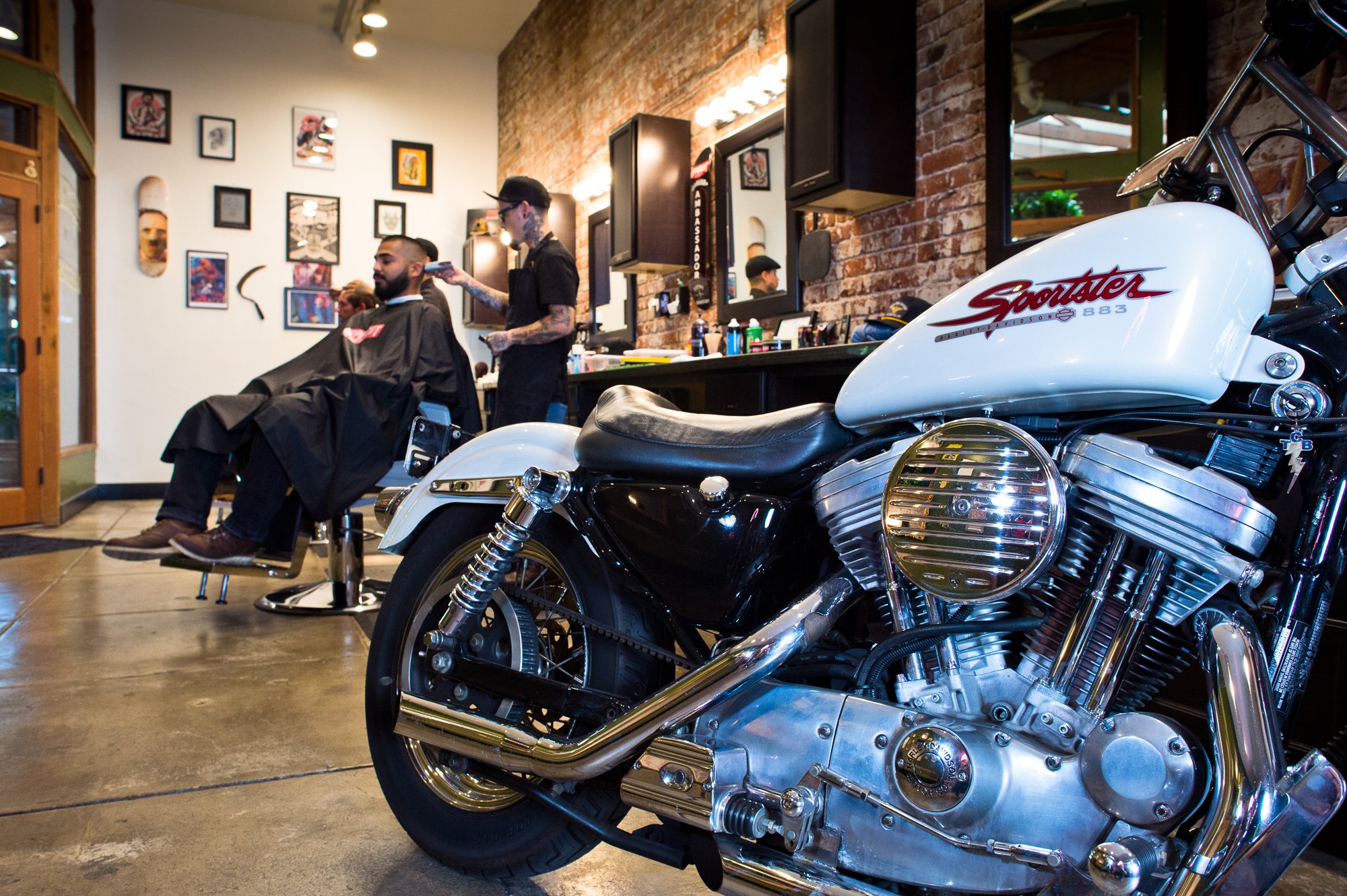  Photograph of a motorcycle inside the Electric Barbershop in Riverside, California  