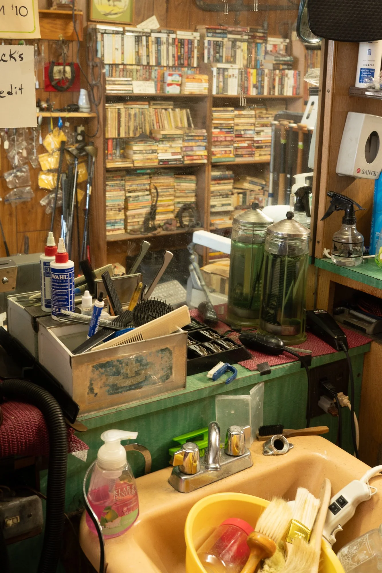  Photograph of a cluttered old barbershop in Arkansas  