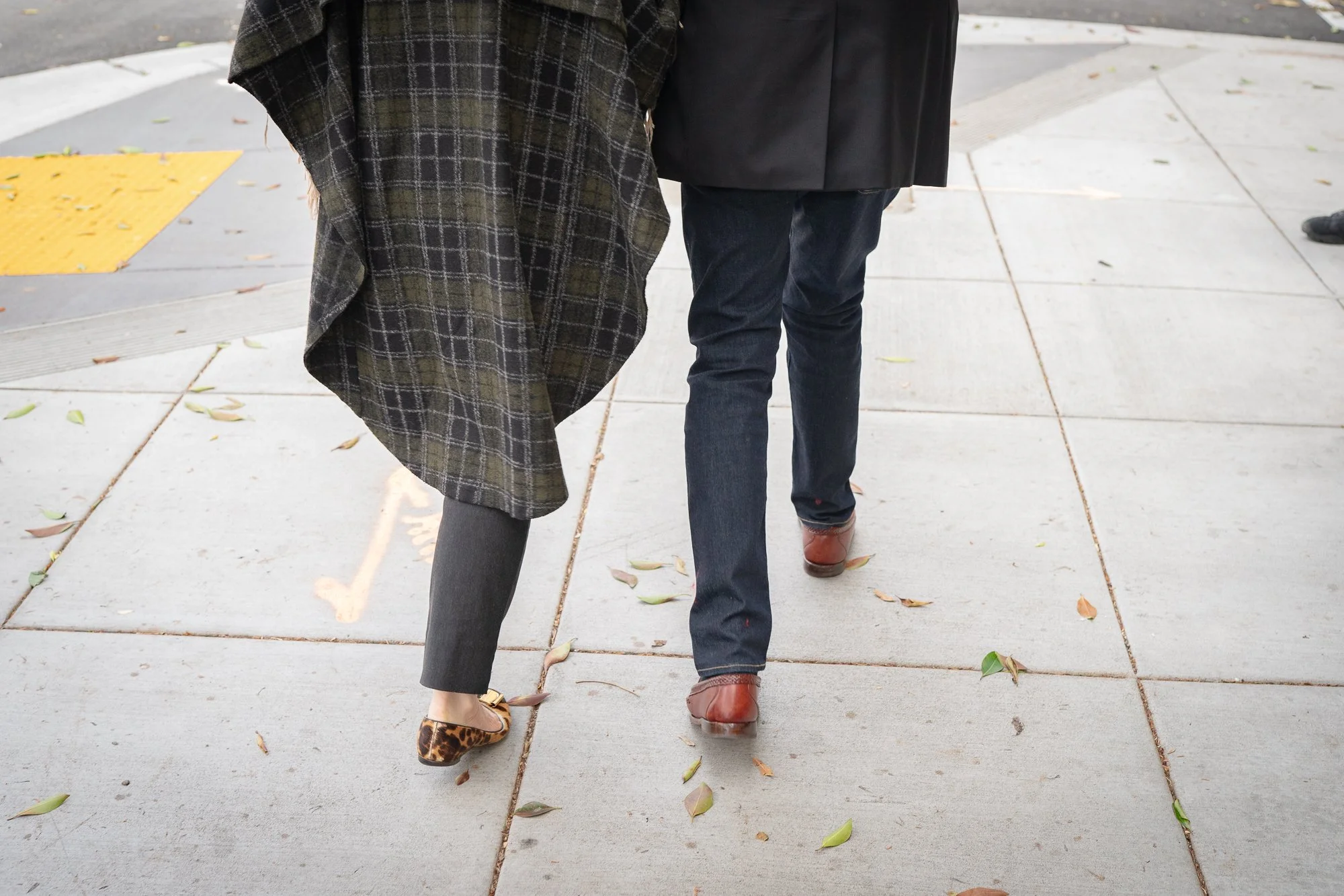  Photographs of a couple walking together in the streets of San Francisco, California  