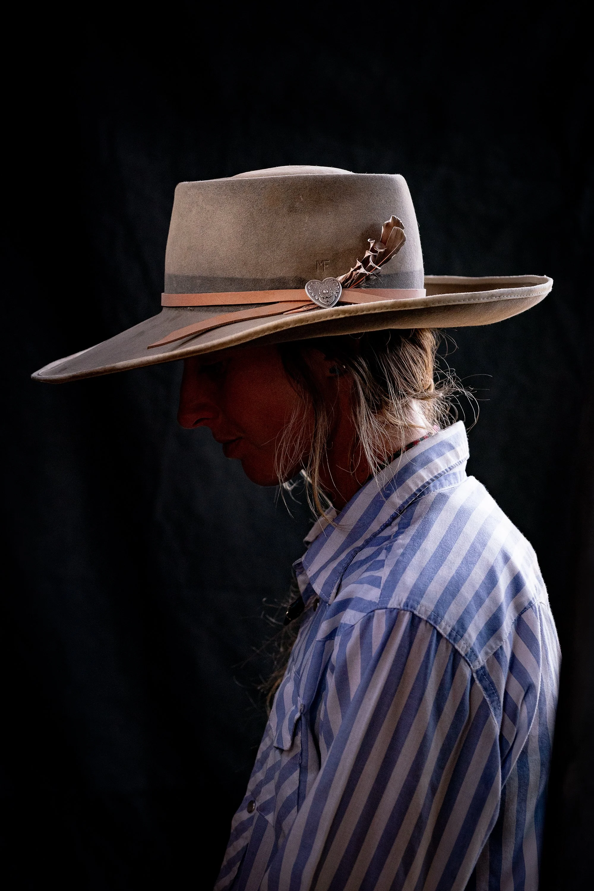  Classic portrait of a female buckaroo on a Nevada cattle ranch 