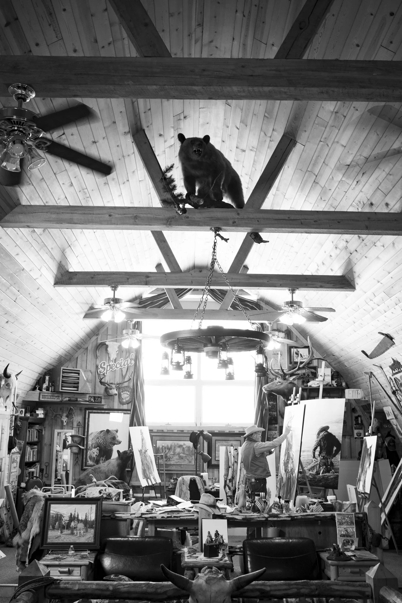 Charcoal artist Doug Monson at work in his studio at the Western Skies Gallery in Afton, Wyoming