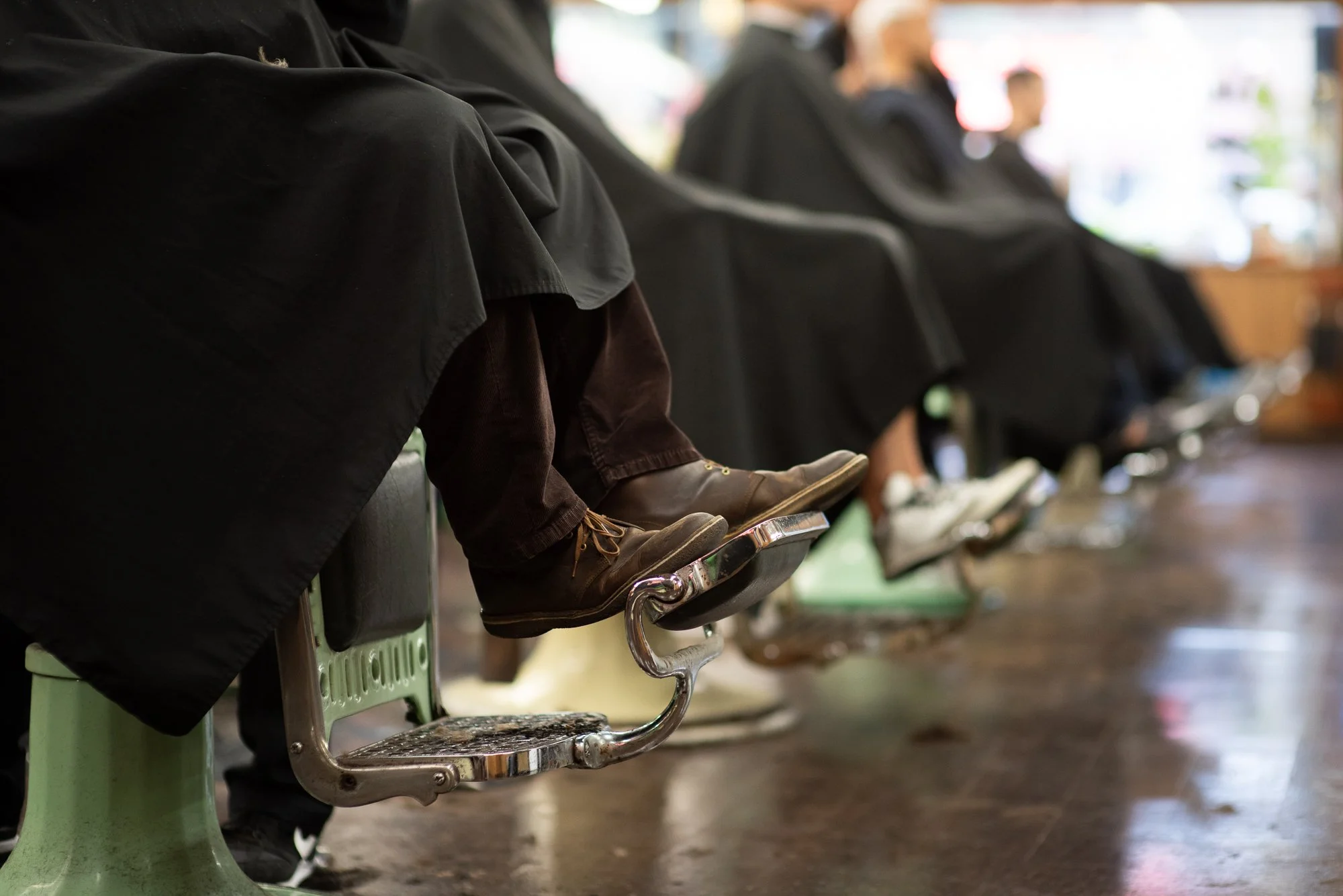 Row of vintage barber chairs at Joe’s Barbershop in Chicago