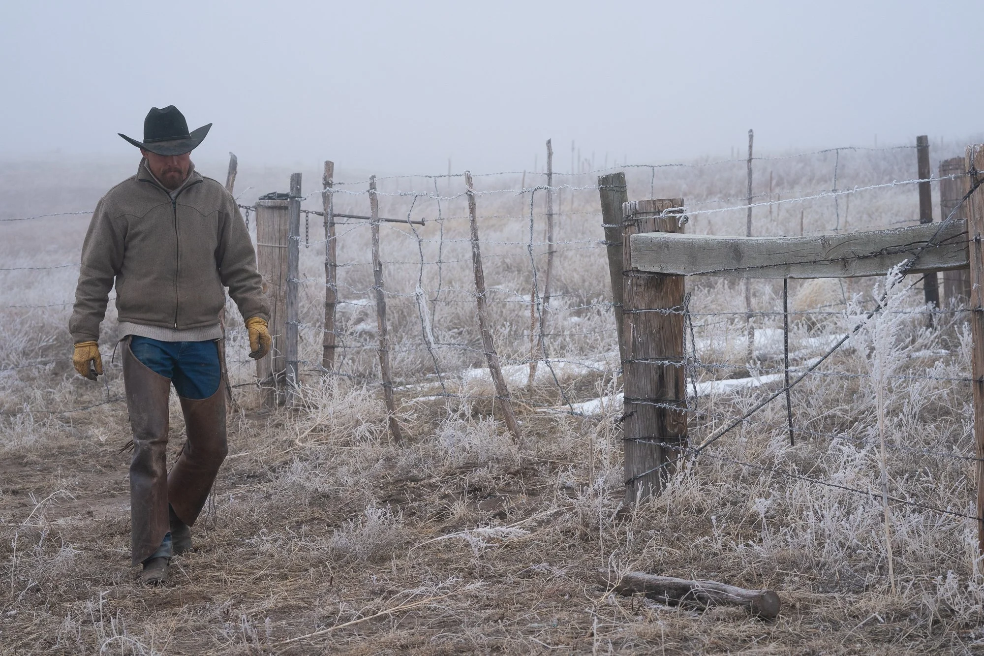 Portrait of a working cowboy photographed on a Colorado cattle ranch by western lifestyle photographer Rob Hammer.