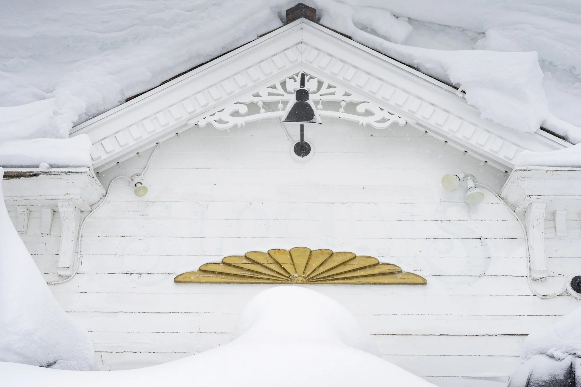 Buildings covered in snow after a record breaking winter storm in Mammoth Lakes, California