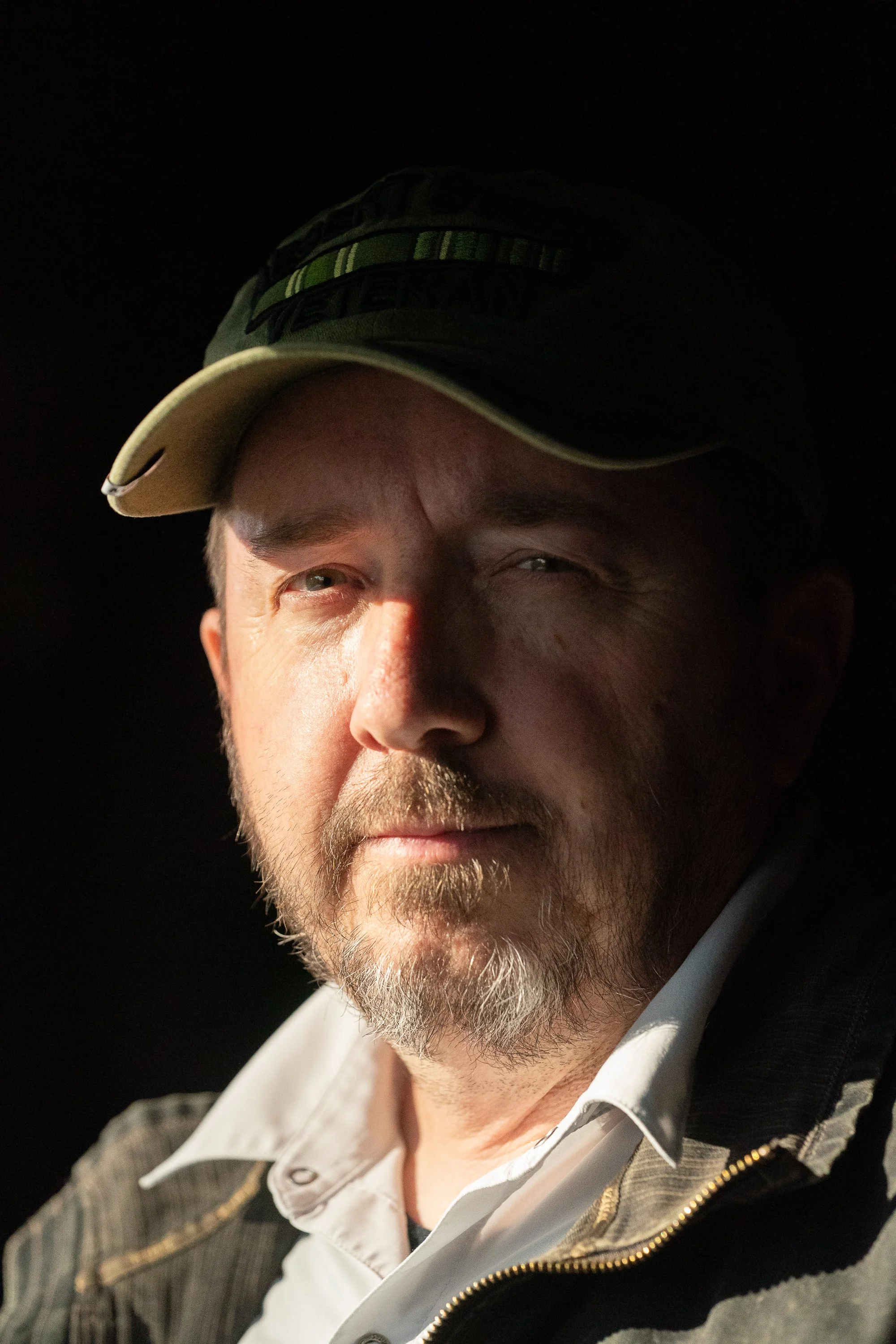 Close portrait of a veteran wearing a cap during an authentic brand photography campaign