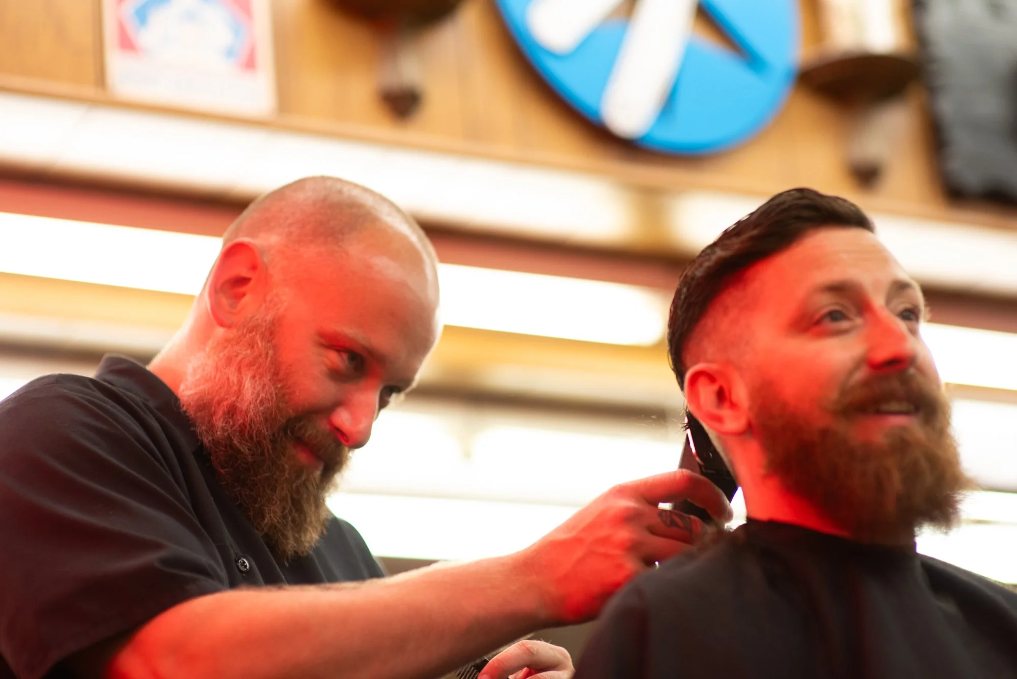 Customer getting a haircut at Joe’s Barbershop in Chicago