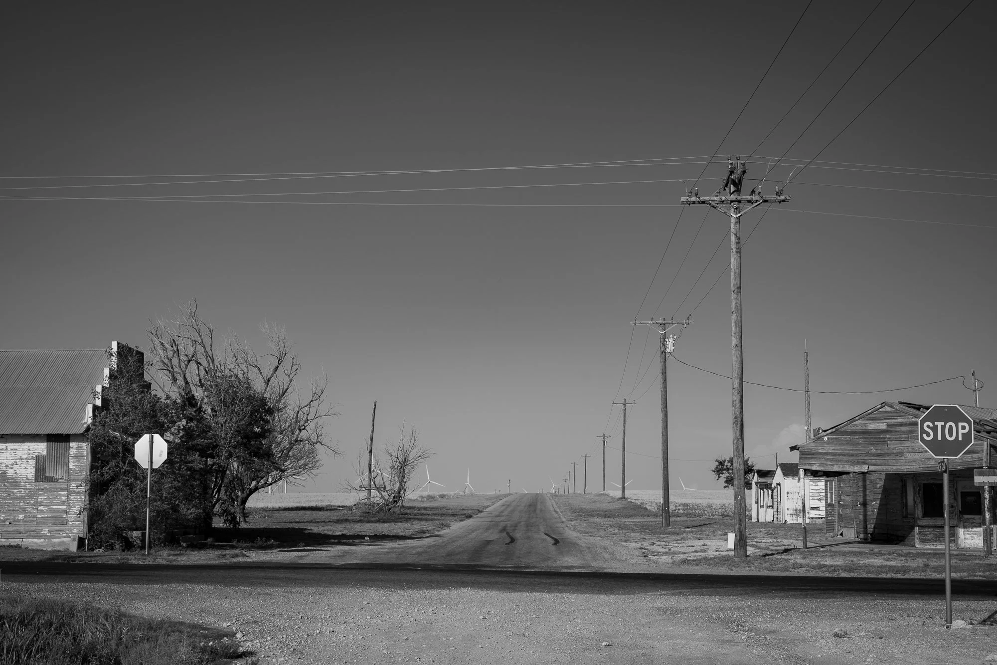 Empty intersection with abandoned buildings on the Llano Estacado