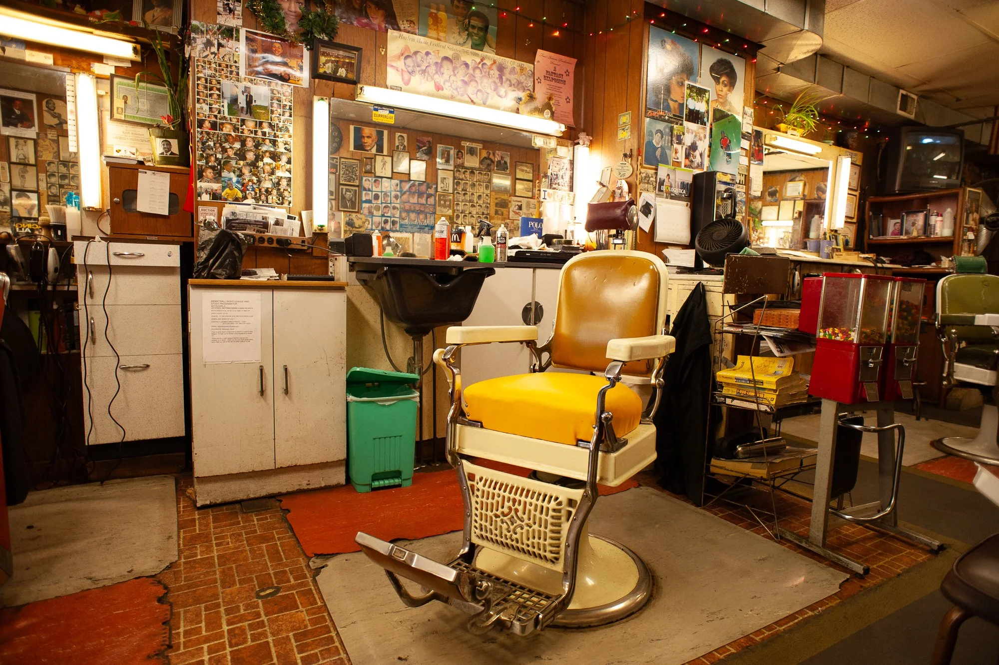Yellow vintage barber chair and shop details inside Stancil’s Barbershop Albany NY historic interior 2011