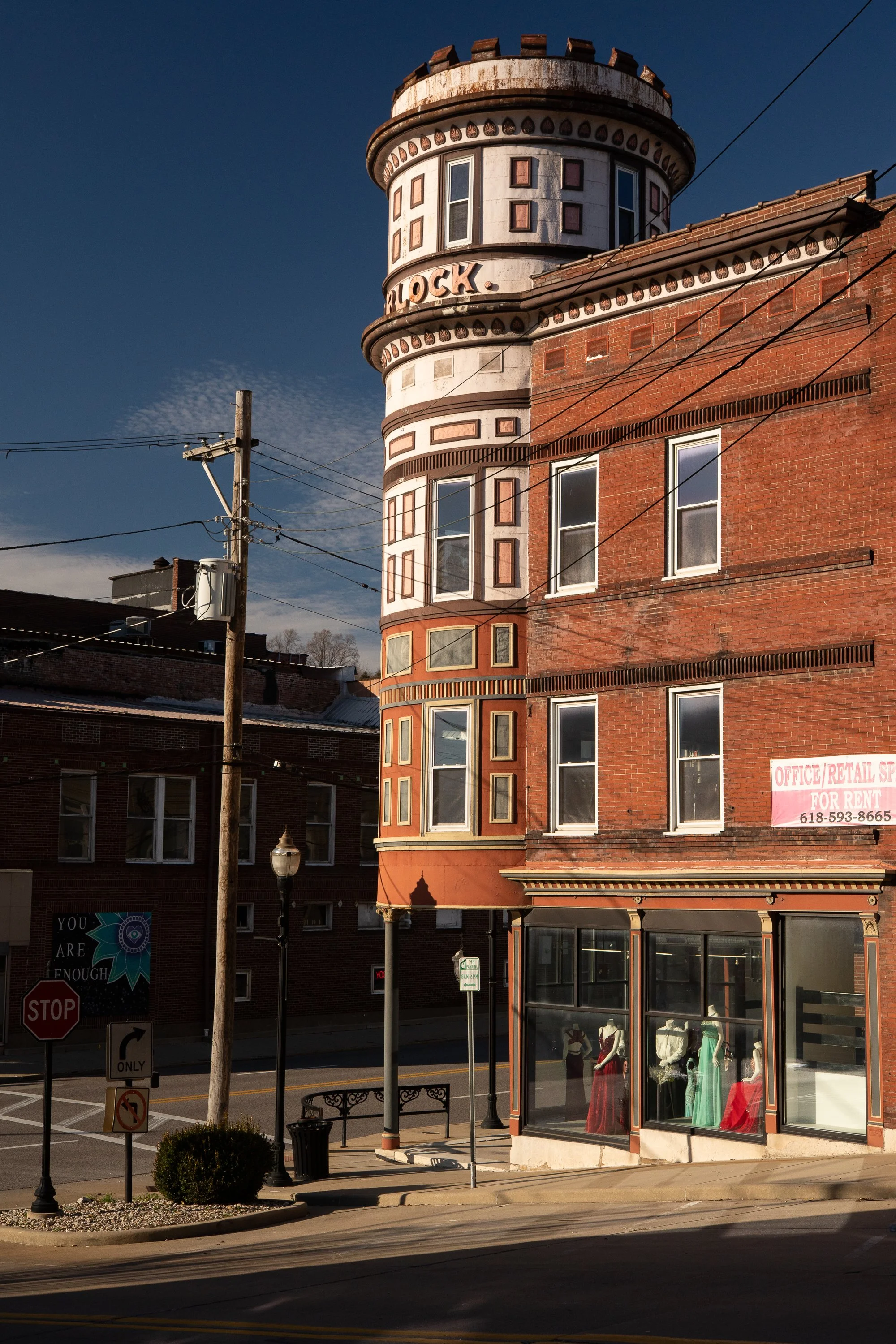Round corner tower on a historic brick building in downtown Alton, Illinois