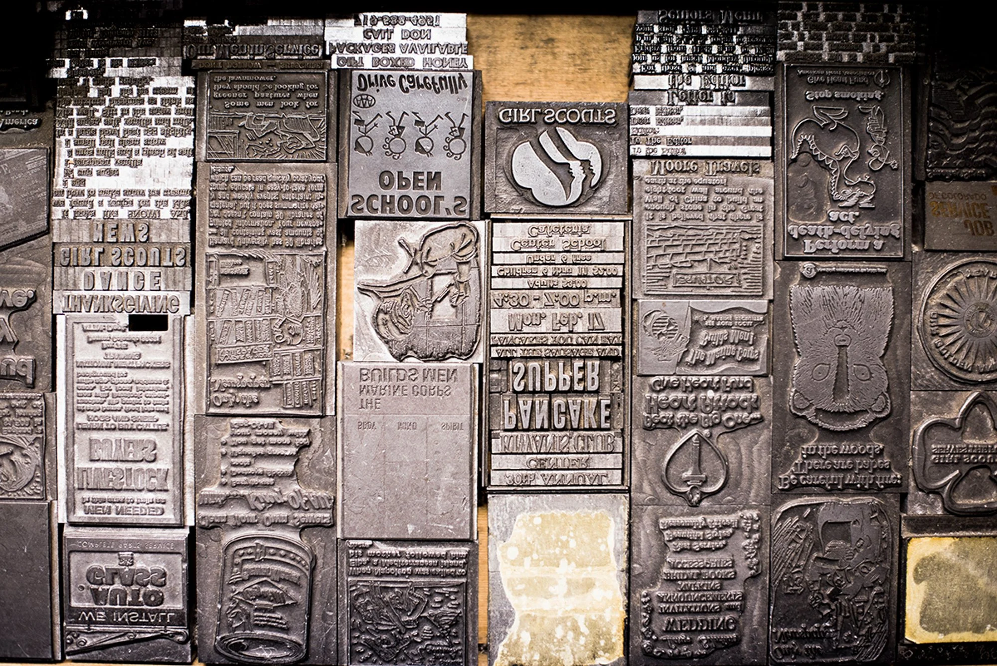 Metal printing plates with reversed text and illustrations