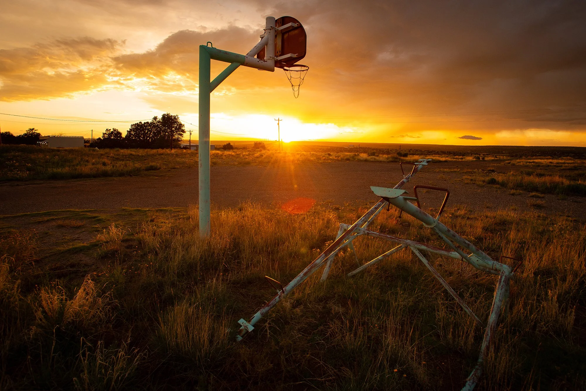 basketball hoop at sunset in rural landscape fine art photography print