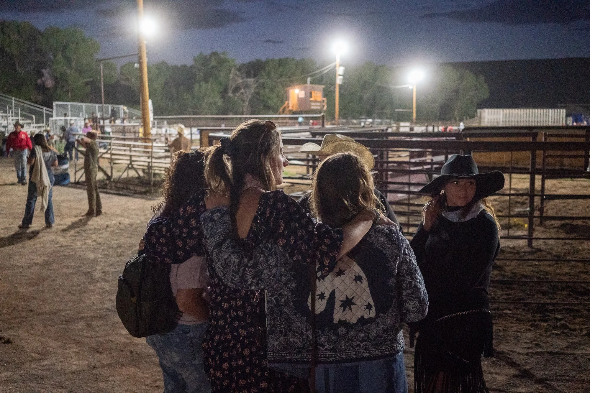 Families walk through the rodeo grounds after the evening events in Dubois Wyoming