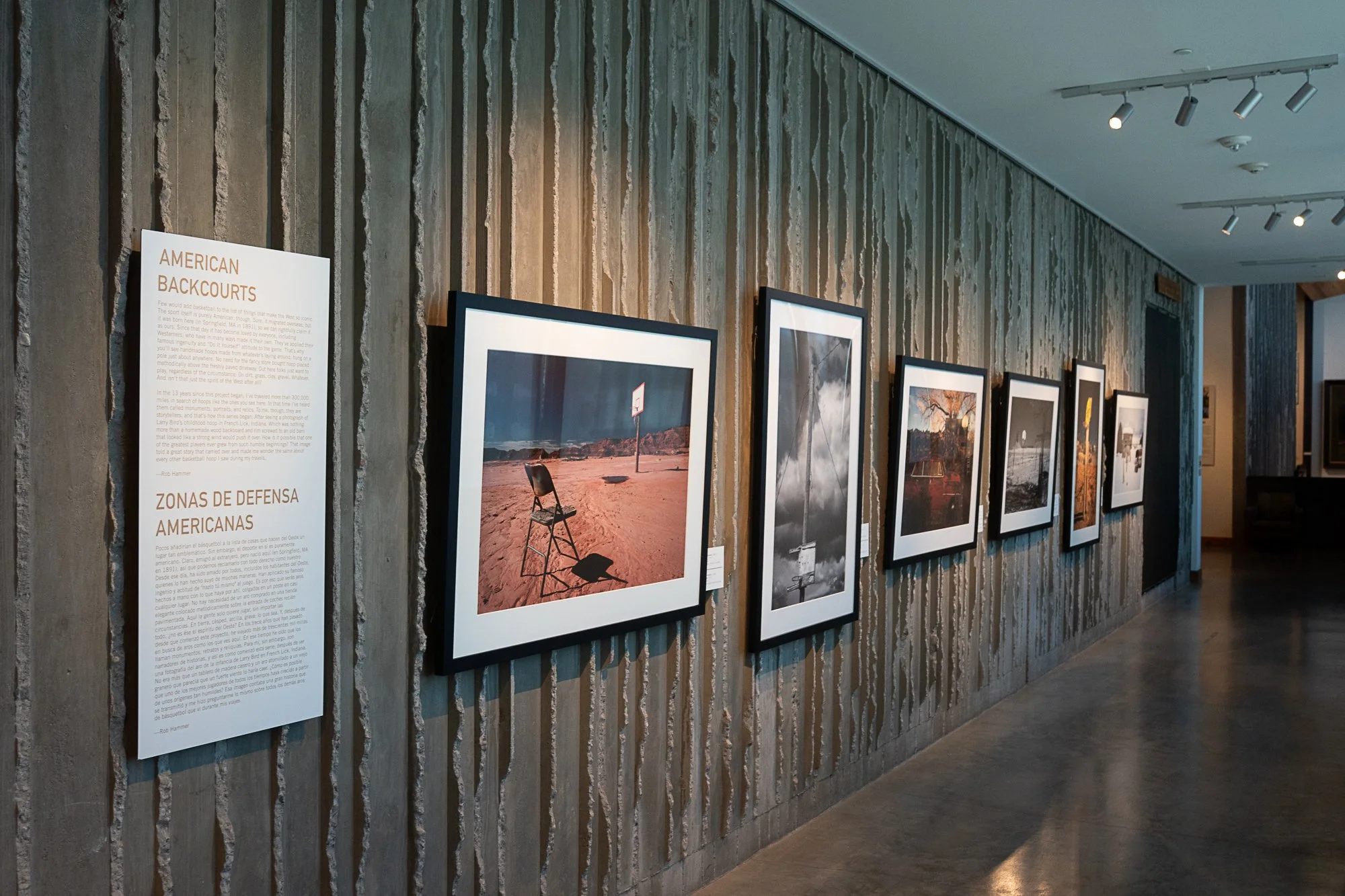 Basketball hoop photography prints displayed in gallery exhibition from the American Backcourts series