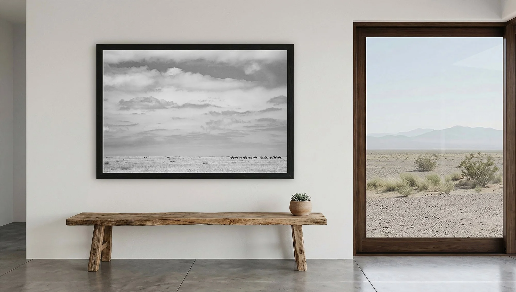 A large black and white cowboy photography print displayed in a modern interior, ideal for minimalist wall art and neutral home decor