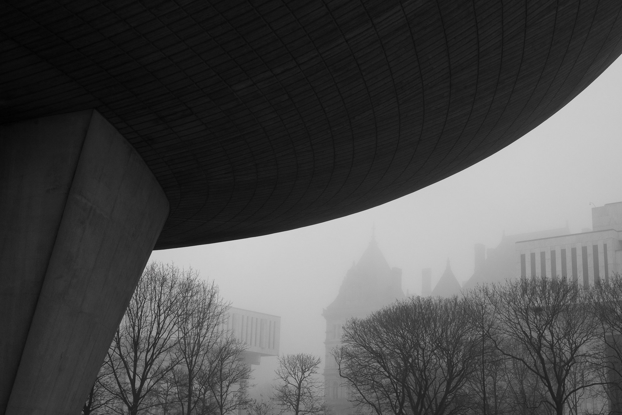 Black and white fine art photograph of The Egg and architecture in Albany, NY