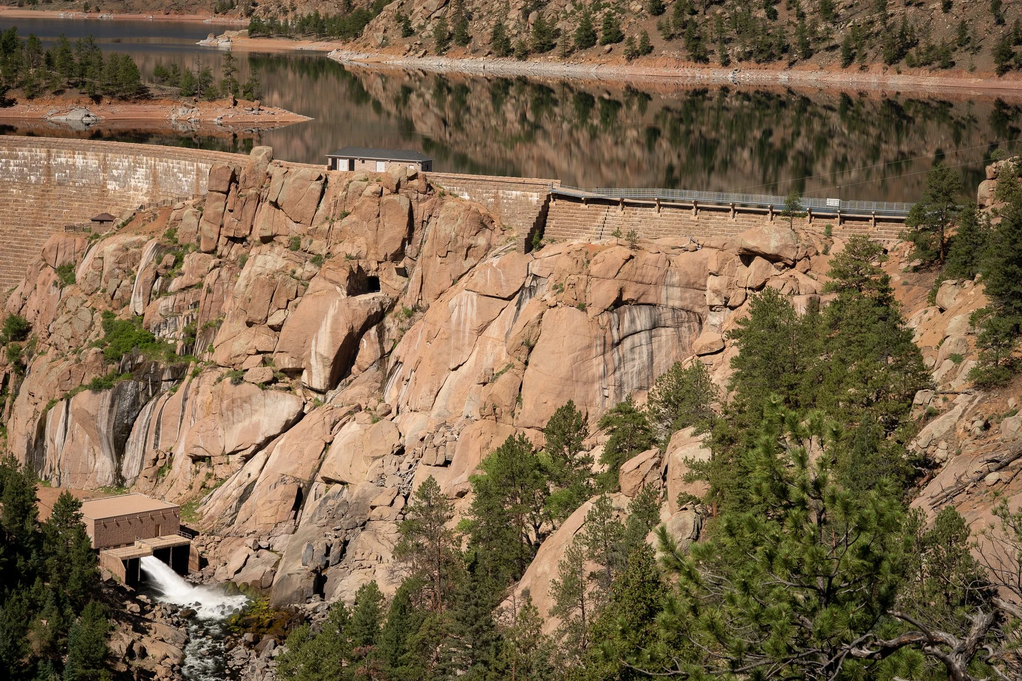 Photograph of Cheesman Reservoir and the water flowing out of the bottom release