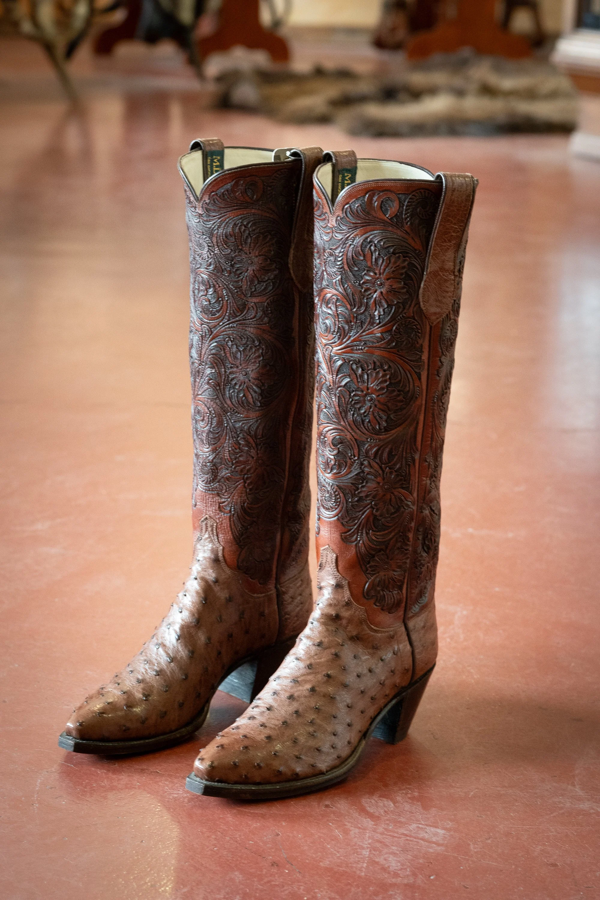 Finished pair of handmade cowboy boots by ML Leddy’s in San Angelo Texas