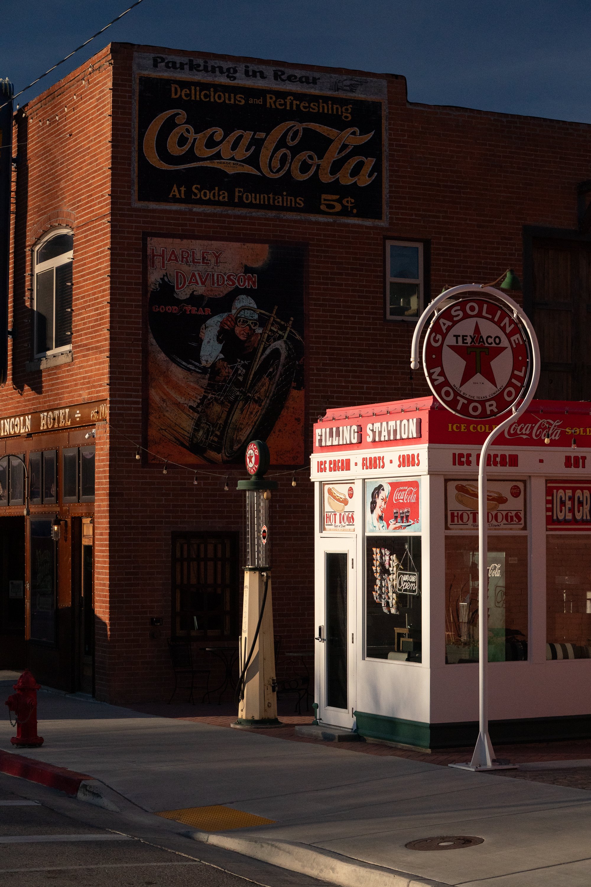 Lincoln Hotel and Texaco gasoline sign in downtown Helper Utah