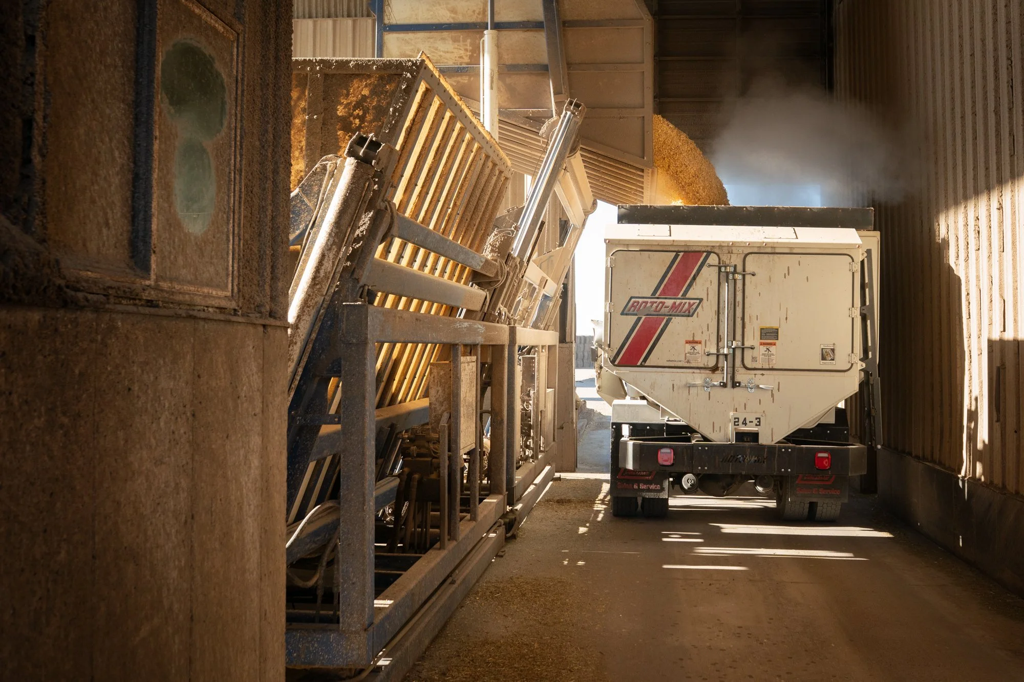 Feed truck is loaded beneath the feed mill at Magnum Feedyard in Colorado