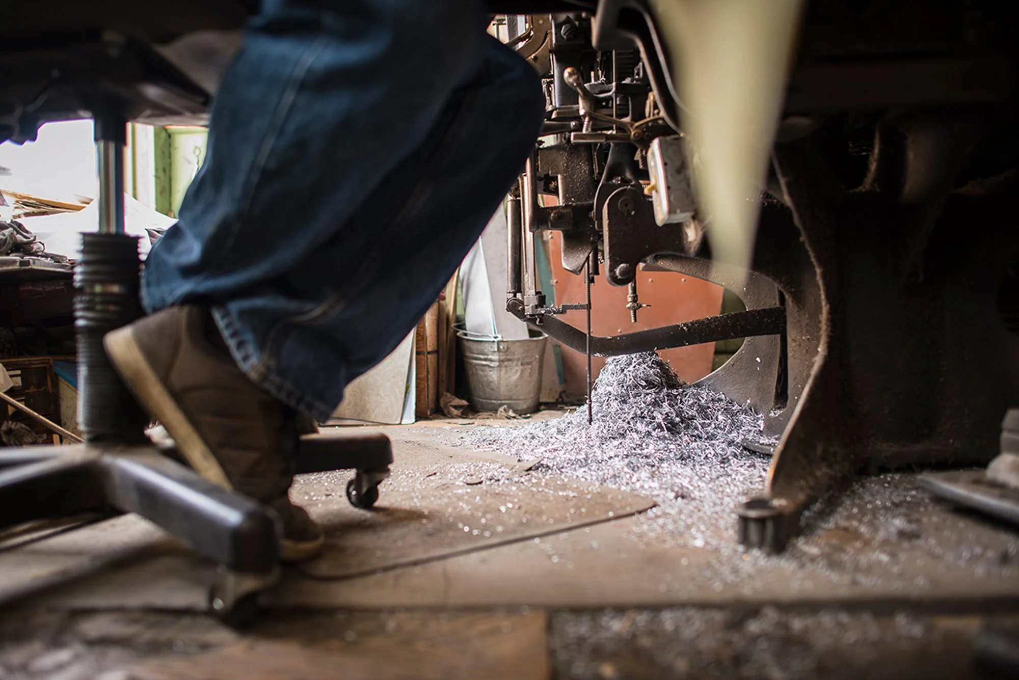 Metal shavings beneath machinery inside the Saguache Crescent