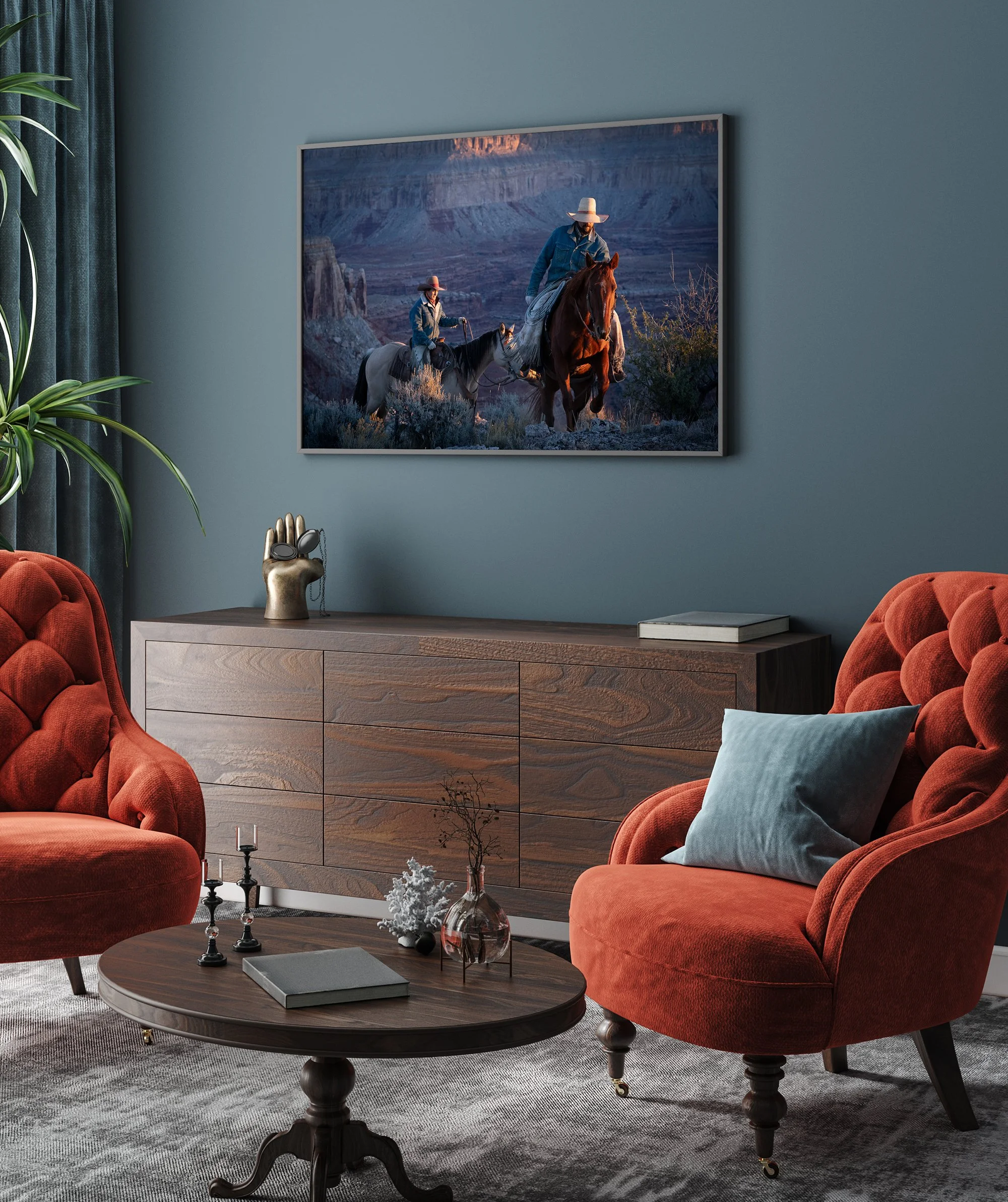 Western cowboy wall art print featuring riders on horseback, shown in a modern interior with mid-century furnishings.