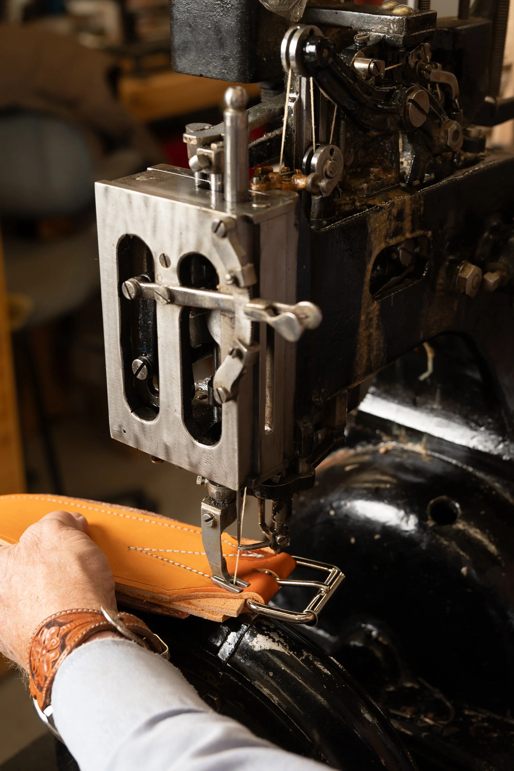 Vintage leather sewing machine used in a Western saddle shop