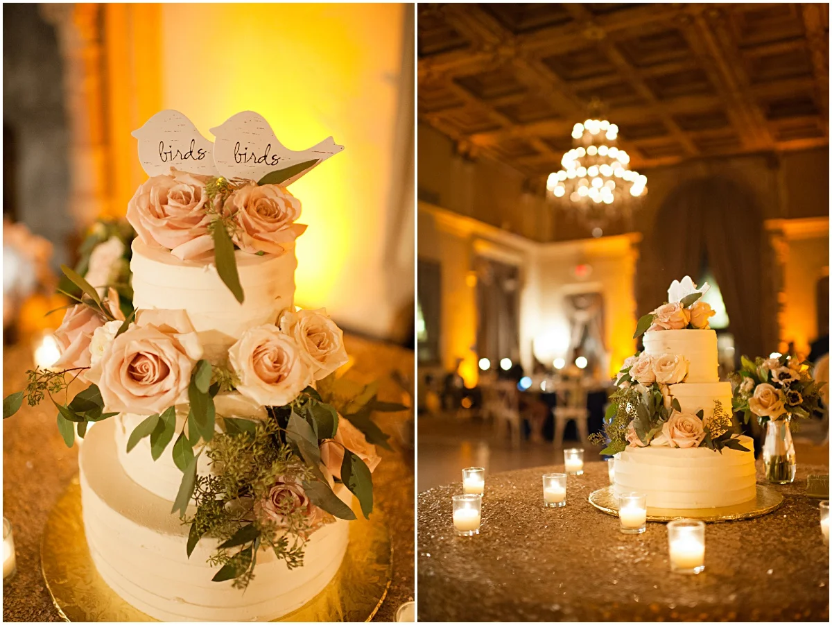 White rose buttercream wedding cake with wooden bird toppers