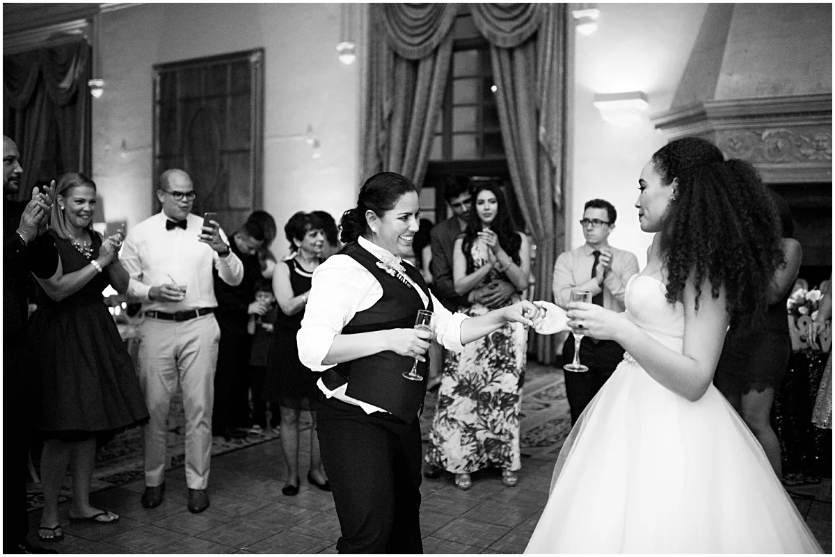black and white reception photo of newlyweds