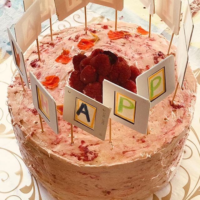 Lemon-Raspberry layer cake with slide holders. Birthday cake for a photographer