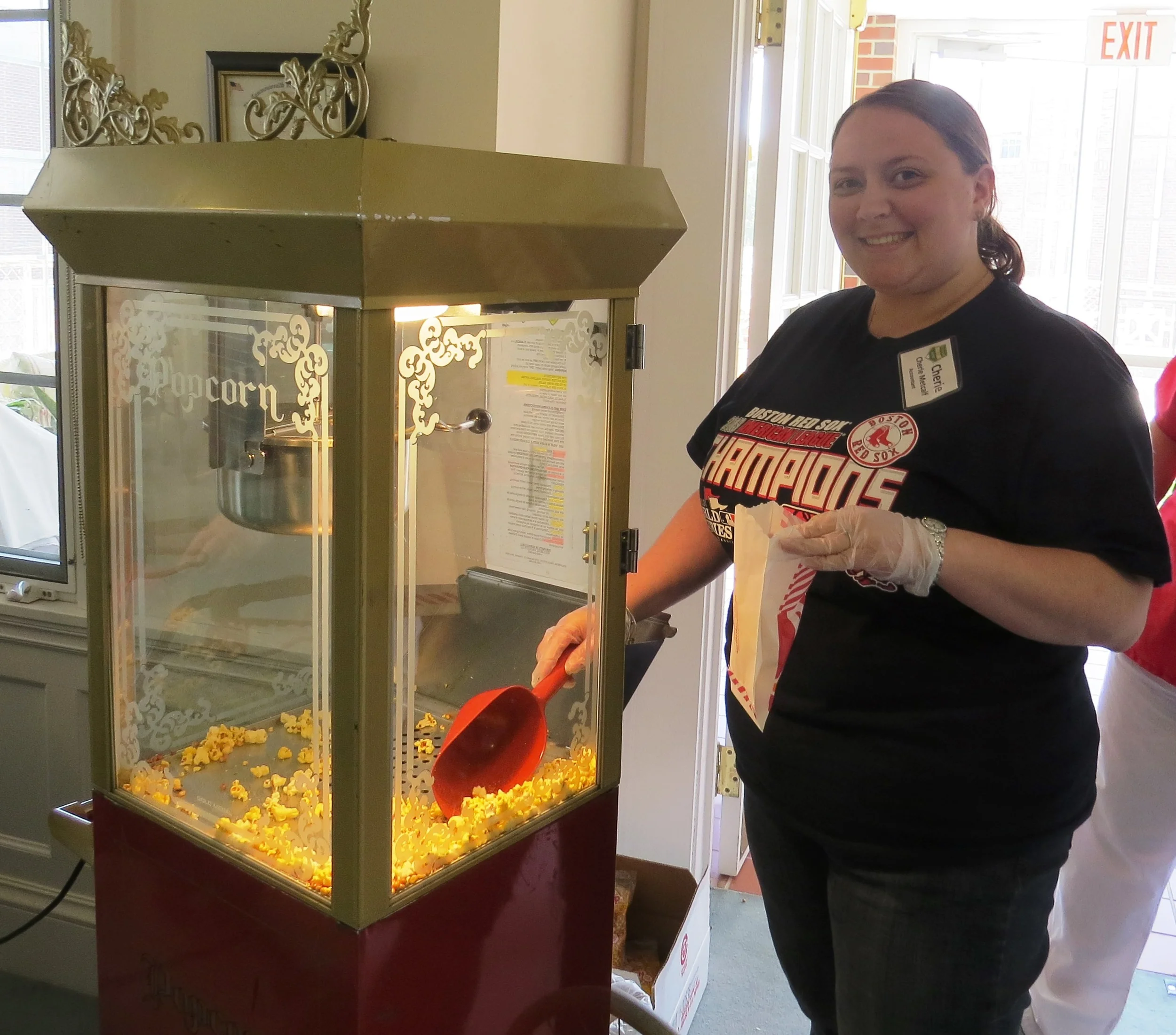 Cherie_Metcalf_and_popcorn_machine.jpg