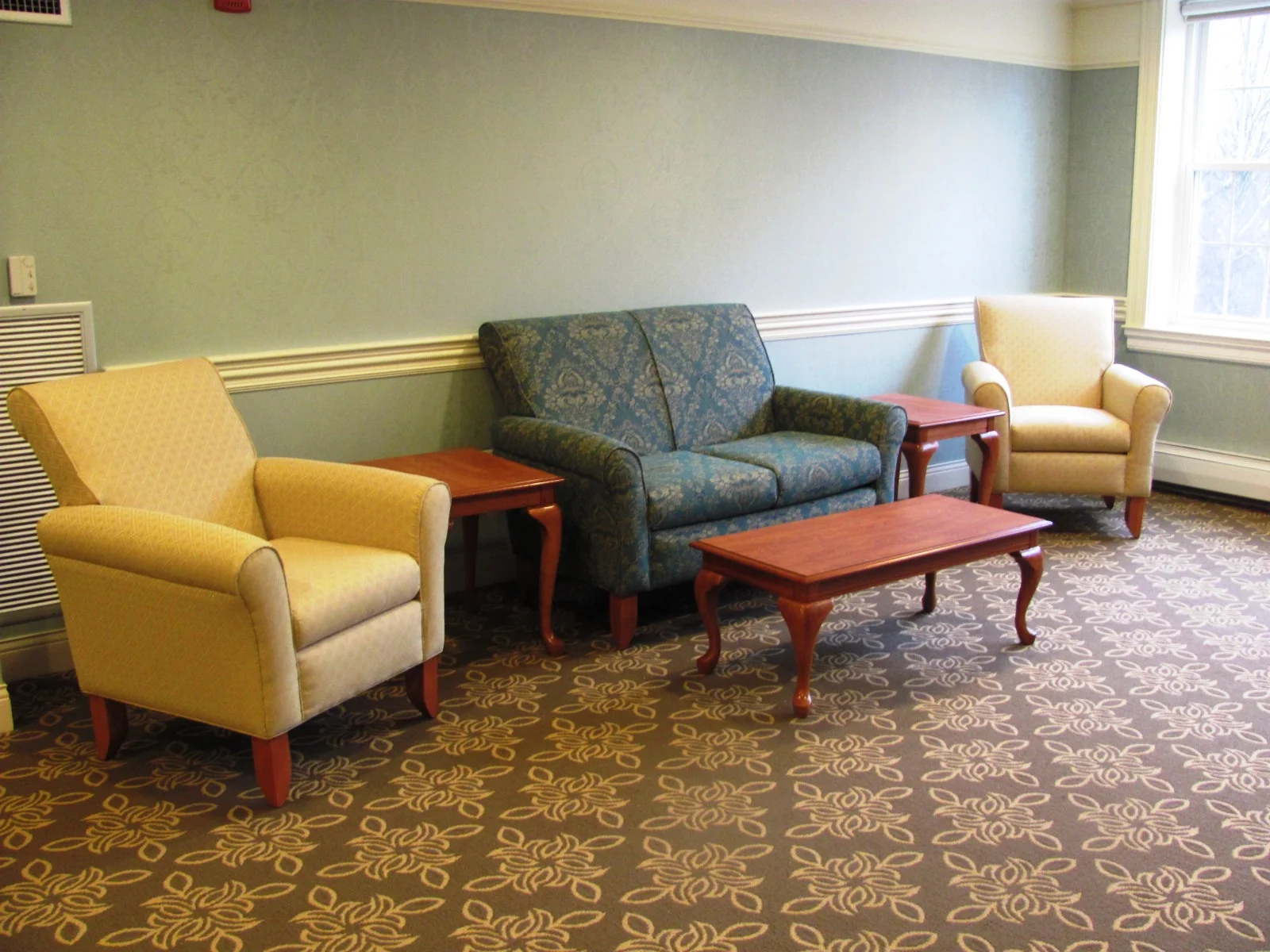 April_15_Seating_across_from_Hearth_in_Living_Room_Area.jpg