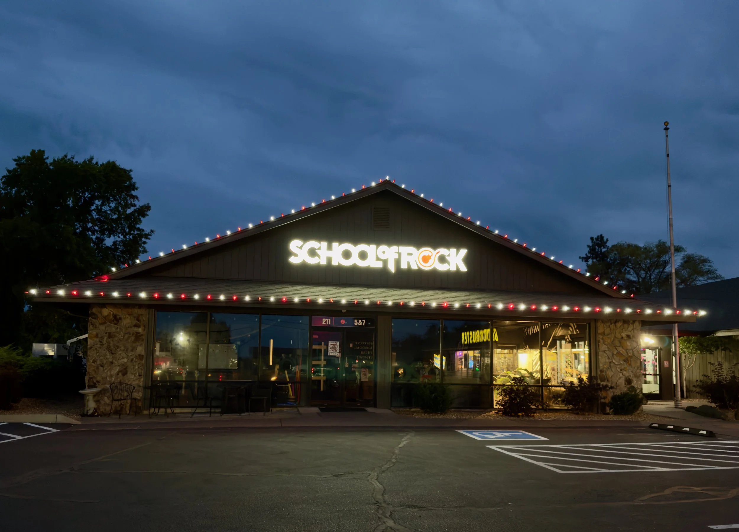 Local commercial business lit up with Red and White LED Bulbs  