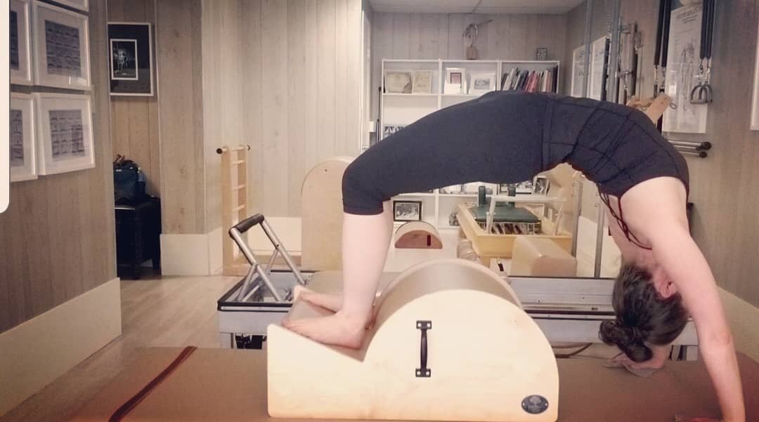 A little Saturday afternoon practice on this beautiful #spinecorrector by #pilateslineage and #thepilatessource #classicalpilates #authenticpilates #miamibeachpilates