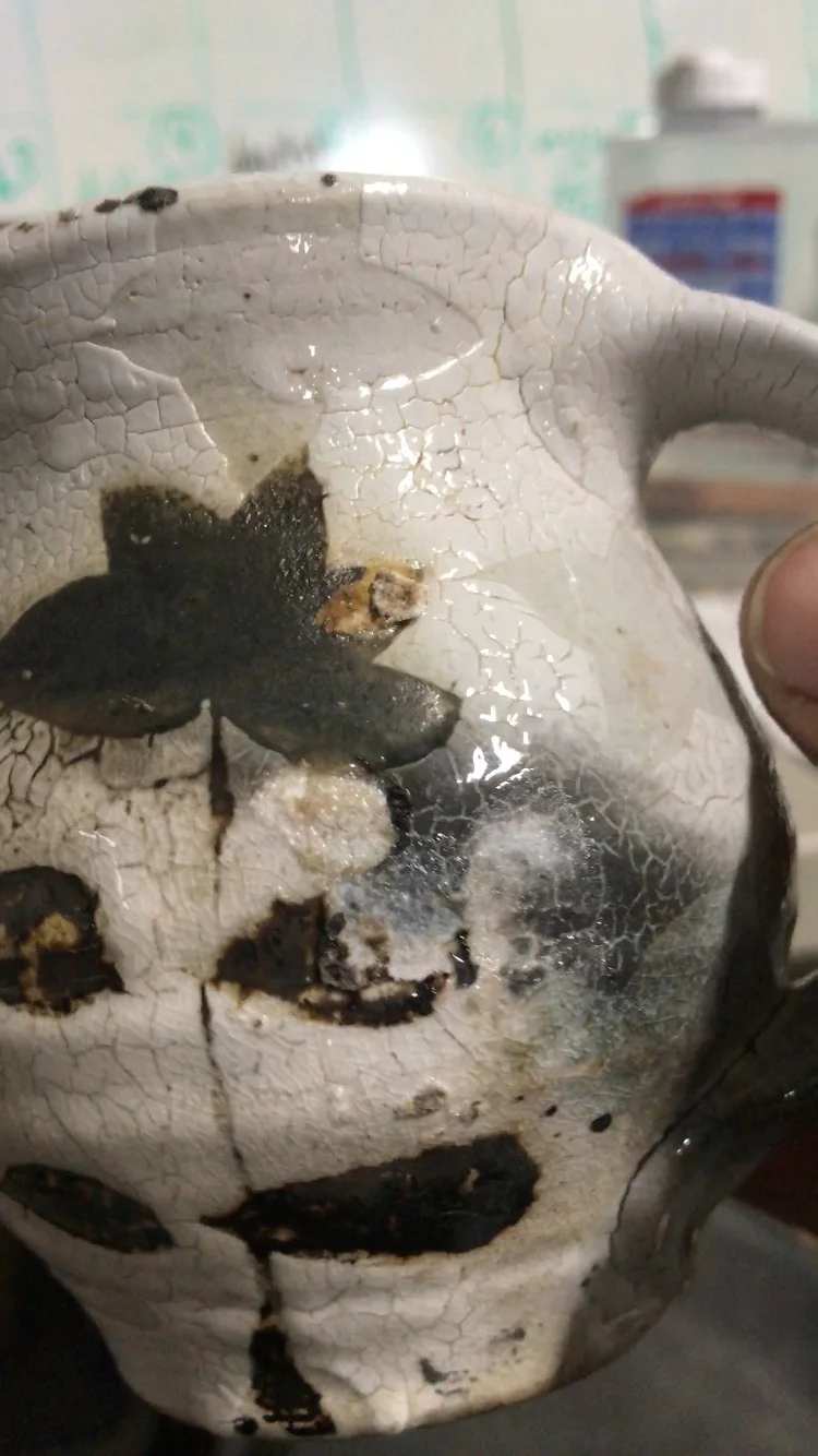 But, by some kind of ceramic miracle, it came out fine, with just a couple of rough spots from its landing on the floor of the kiln.