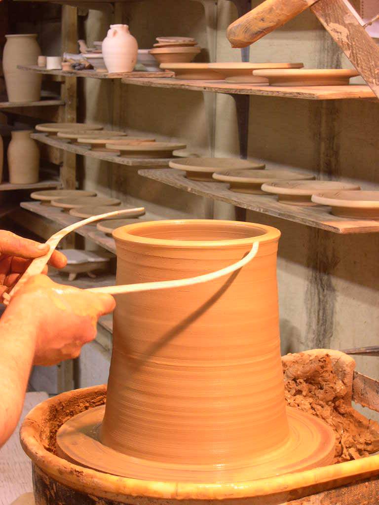 I am measuring the bottom section to match it to the previously thrown cap. I usually throw the cap ever so slightly smaller than the bottom section.