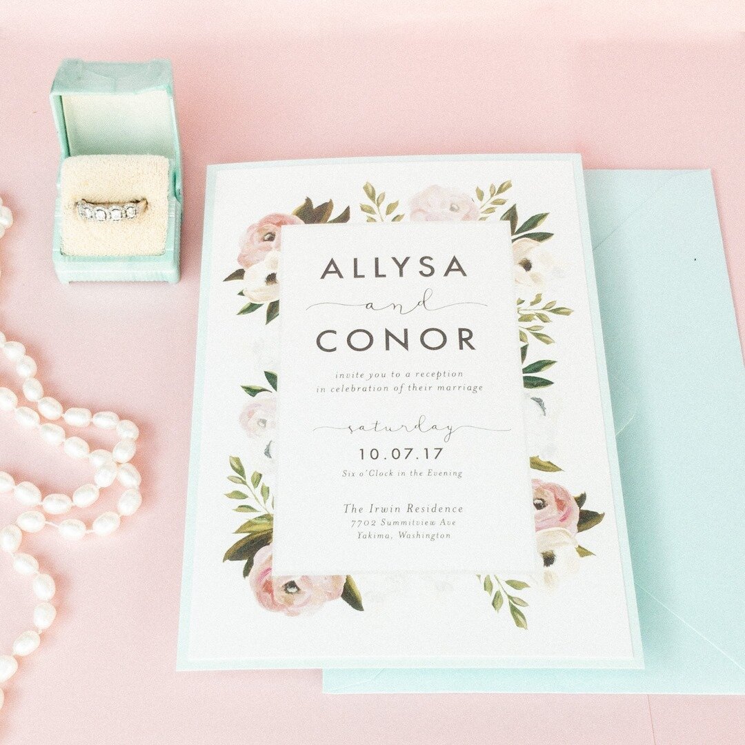 Gotta love a good floral!  Love the color combinations of the soft florals with the blue envelope.  Don't be afraid to play with  color.  When we create your custom invitation we have sample colors, paper and envelopes to choose from so you can see e