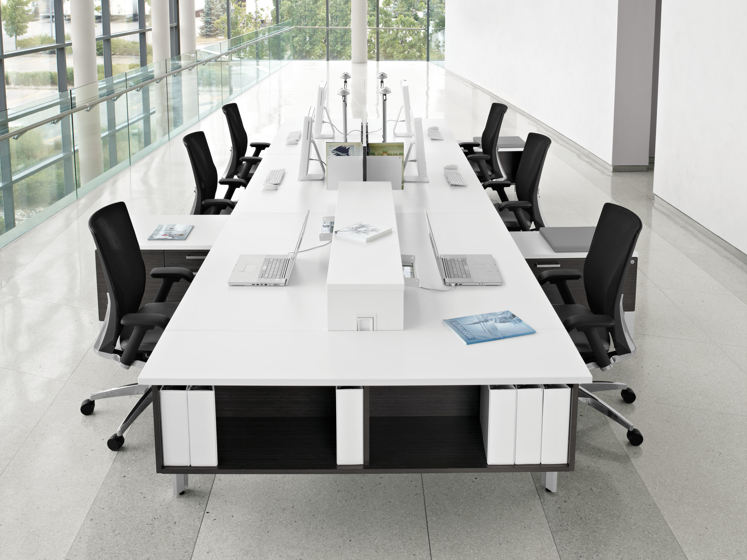 Bridges 2 is a collaborative benching system designed and developed for Global Contract. At its core, it focuses on linear, back to back table assemblies, including storage solutions, glass and laminate partitions, out-of-sight wire management and easy expansion from single to multi-person stations. Bridges 2 received a 2013 ADEX Platinum Award for Design Excellence.